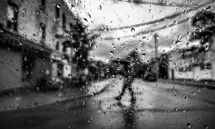 rain-glass_queen-west_man-umbrella_bw_01.jpg